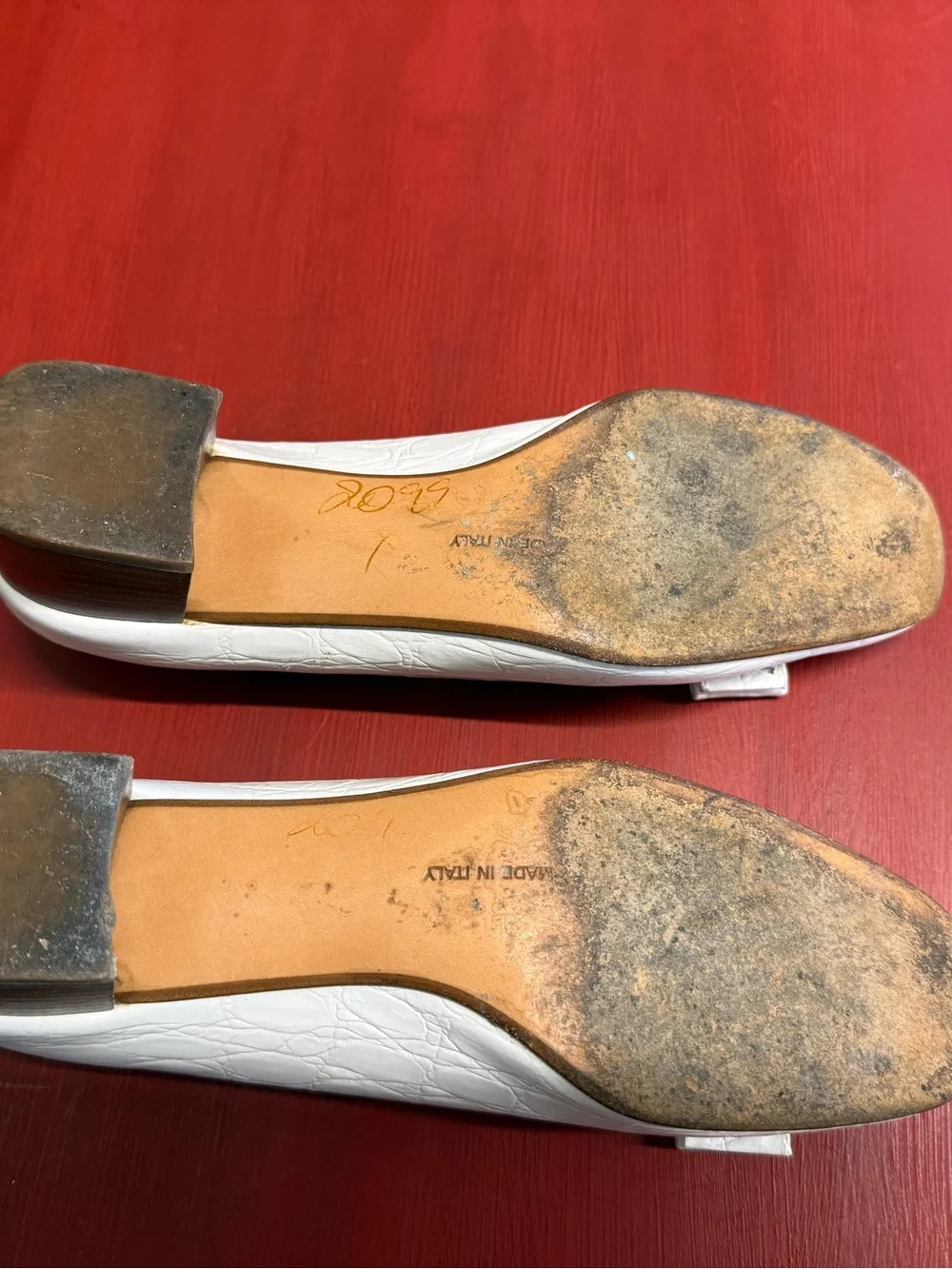 Salvatore Ferragamo White Leather Vara Bow Flats with Gold Accent